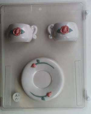 3-D Teacup & saucer decorated with rose design AO081