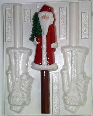 Elongated old-fashioned Santa holding a small Christmas tree C129